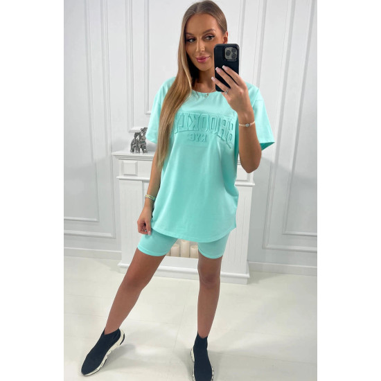 Sieviešu komplekts Korina in mint 24017 - Rīcība Sieviešu komplekts Korina in mint Sporta tērpi