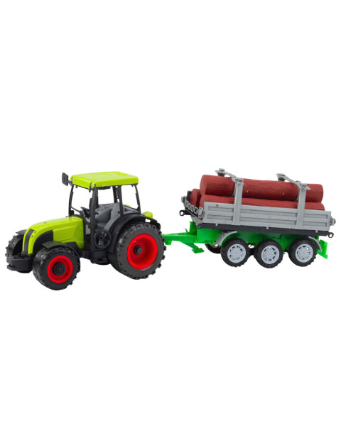 Zaļš traktors ar piekabi baļķiem