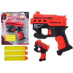 Sarkans mini pistolete ar putas patroniem