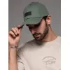 Unisex zaļa cepure Grid V6 OM-ACCS-0104