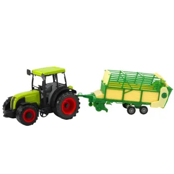 Zaļš traktors ar piekabi