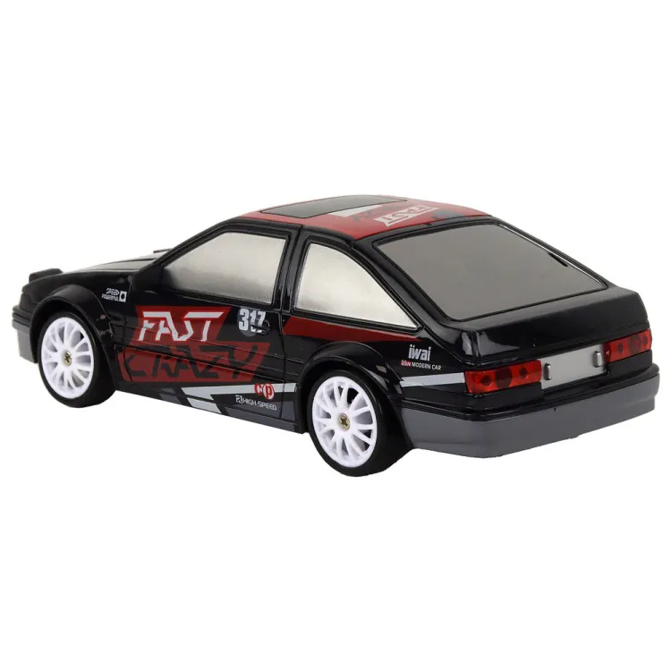 Tālvadības pults vadāma sporta automašīna R/C 1:24 melnā krāsā ar maināmiem riteņiem Radio vadāmās rotaļlietas