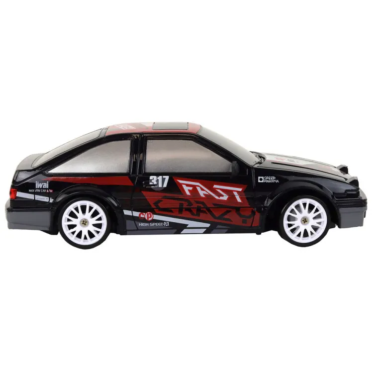 Tālvadības pults vadāma sporta automašīna R/C 1:24 melnā krāsā ar maināmiem riteņiem Radio vadāmās rotaļlietas