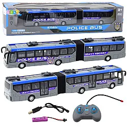 Pilkas policijos autobusas valdomas pultu
