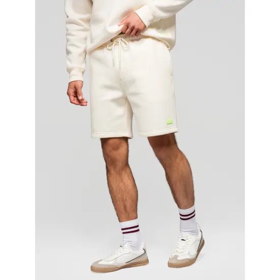 Unisex šortu komplekts smilškrāsā/gaiši violētā krāsā Level Up