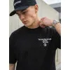 Vīriešu melns oversize t-krekls Jevin T-krekls ar saukļiem