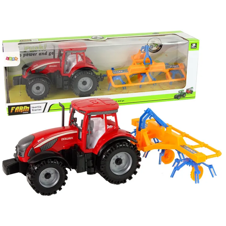 Sarkans traktors ar grābekļa berzes piedziņu