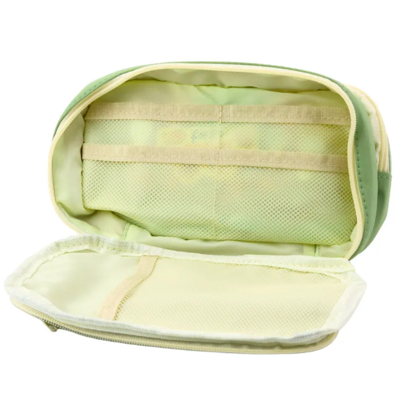 Zaļš skolas penālis ar kabatām 22 cm Vimpeļi
