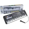 Melns pianīns ar 61 taustiņu un mikrofonu mācībām. Mūzikas instrumentai