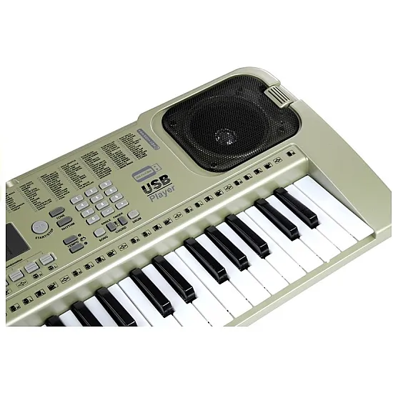 Pilkas muzikinis pianinas su mikrofonu Muzikos instrumentai
