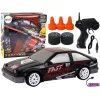 Tālvadības pults vadāma sporta automašīna R/C 1:24 melnā krāsā ar maināmiem riteņiem Radio vadāmās rotaļlietas