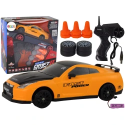 Tālvadības pults vadāma sporta automašīna R/C 1:24 dzeltena ar maināmiem riteņiem Series