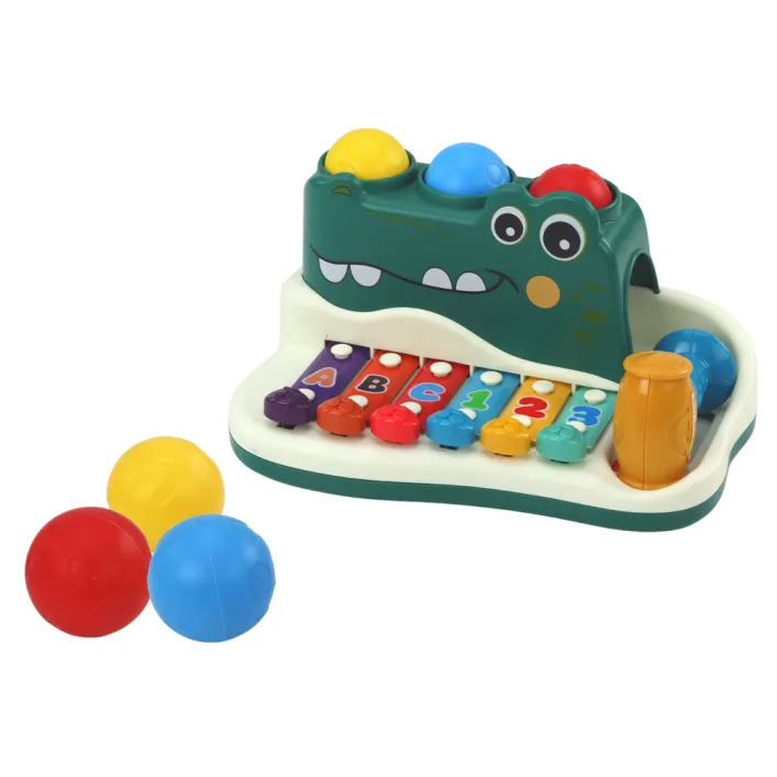 Krokodilformas ksilofona klavieres Mūzikas instrumentai